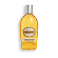 SlimBag almond shower oil bottle with milky lather, nourishing cleansing and softening skincare for smooth, hydrated skin.
